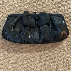Franchi black sequined clutch.